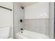 Updated bathroom with herringbone tile shower and neutral colors at 4848 N Woodmere Fairway -- # 15, Scottsdale, AZ 85251