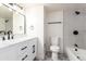 Contemporary bathroom with marble countertop and black accents at 4848 N Woodmere Fairway -- # 15, Scottsdale, AZ 85251