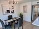 Modern dining area with a sleek table and chairs at 4848 N Woodmere Fairway -- # 15, Scottsdale, AZ 85251