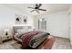 Bright bedroom with a ceiling fan and neutral decor at 4848 N Woodmere Fairway -- # 15, Scottsdale, AZ 85251
