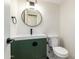 Stylish bathroom featuring a green vanity and modern fixtures at 4848 N Woodmere Fairway -- # 15, Scottsdale, AZ 85251