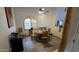 Charming dining room with a round wooden table and unique chairs at 2926 W Tanya Trl, Phoenix, AZ 85086