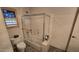 Bathroom with tub and shower, toilet, and window at 2926 W Tanya Trl, Phoenix, AZ 85086