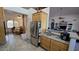 Kitchen features stainless steel appliances and a view into the dining area at 2926 W Tanya Trl, Phoenix, AZ 85086