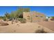 Tan stucco home with two-car garage and desert landscaping at 2926 W Tanya Trl, Phoenix, AZ 85086