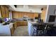 Kitchen with wood cabinets, stainless steel appliances, and tile flooring at 2926 W Tanya Trl, Phoenix, AZ 85086