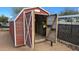 Metal storage shed with double doors, offering ample storage space at 2926 W Tanya Trl, Phoenix, AZ 85086