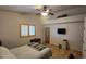 Bedroom with a queen bed, wood flooring, and private access at 2926 W Tanya Trl, Phoenix, AZ 85086