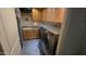 Laundry room with washer, dryer, and built-in cabinets at 2926 W Tanya Trl, Phoenix, AZ 85086
