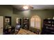 Bright home office with wood flooring, ceiling fan, and abundant natural light at 2926 W Tanya Trl, Phoenix, AZ 85086