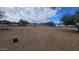 Large, open backyard with gravel and a travel trailer at 2926 W Tanya Trl, Phoenix, AZ 85086