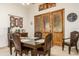 Bright dining area with wood table and access to backyard at 11305 S 195Th Dr, Buckeye, AZ 85326