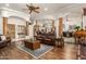 Open living room with hardwood floors and views into the kitchen at 11305 S 195Th Dr, Buckeye, AZ 85326
