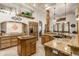 Gourmet kitchen with granite countertops and an island at 11305 S 195Th Dr, Buckeye, AZ 85326