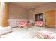 Covered patio furnished with wicker furniture, perfect for relaxing at 11305 S 195Th Dr, Buckeye, AZ 85326