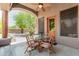 Covered patio with table and chairs, perfect for outdoor dining at 11305 S 195Th Dr, Buckeye, AZ 85326