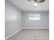 Simple bedroom with tile floors and ceiling fan at 6834 E 4Th St # 8, Scottsdale, AZ 85251