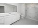 Elegant bathroom with a large walk-in shower and double vanity at 3827 S 97Th Ave, Tolleson, AZ 85353