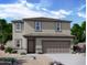 Two-story house with attached garage and desert landscaping at 3827 S 97Th Ave, Tolleson, AZ 85353