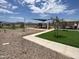Community playground with play equipment and shaded seating at 3827 S 97Th Ave, Tolleson, AZ 85353