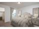 Bright bedroom with neutral decor and a walk-in closet at 3827 S 97Th Ave, Tolleson, AZ 85353