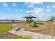 Community playground with play equipment and shaded seating at 3827 S 97Th Ave, Tolleson, AZ 85353