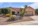 Single story home with desert landscaping and two-car garage at 15131 W Black Gold Ln, Sun City West, AZ 85375