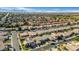 Aerial view of a large residential area with many houses at 11519 W Clover Way, Avondale, AZ 85392