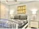 Spacious bedroom with a queen bed and wall decor at 7625 E Camelback Rd # B108, Scottsdale, AZ 85251