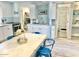 Modern white kitchen with subway tile backsplash at 7625 E Camelback Rd # B108, Scottsdale, AZ 85251