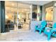 View of the living area from a relaxing patio with seating at 7625 E Camelback Rd # B108, Scottsdale, AZ 85251
