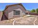 Side yard with flagstone pathway and block wall at , Goodyear, AZ 85338