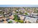 Aerial view of the house and surrounding neighborhood, showing its location and backyard at 8151 W Clarendon Ave, Phoenix, AZ 85033