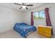 Bedroom with a double bed and ceiling fan at 8151 W Clarendon Ave, Phoenix, AZ 85033