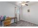 Bedroom with a desk, chair, and ceiling fan at 8151 W Clarendon Ave, Phoenix, AZ 85033