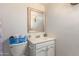 Clean bathroom with a vanity, toilet, and shower at 8151 W Clarendon Ave, Phoenix, AZ 85033