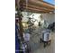 Covered outdoor workshop area with bike repair stand and tools at 1122 E Portland St # B, Phoenix, AZ 85006