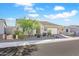 Single story home with desert landscaping and driveway at 17917 W Amberwood Dr, Goodyear, AZ 85338
