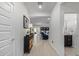 Bright and spacious entryway with tile flooring, offering views to the living room and kitchen at 23852 N 167Th Ln, Surprise, AZ 85387