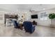 Relaxing living room with comfortable seating and a large-screen TV at 23852 N 167Th Ln, Surprise, AZ 85387