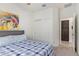 Bedroom with double doors to closet and bathroom access at 23852 N 167Th Ln, Surprise, AZ 85387