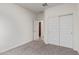 Bedroom with closet and access to another room at 23852 N 167Th Ln, Surprise, AZ 85387