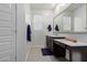 Clean bathroom with a double vanity and plenty of storage space at 23852 N 167Th Ln, Surprise, AZ 85387