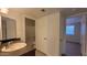 Bathroom with vanity, bathtub, and access to a bedroom at 8256 E Arabian Trl # 239, Scottsdale, AZ 85258