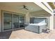Hot tub on covered patio, next to sliding glass doors at 17917 W Amberwood Dr, Goodyear, AZ 85338
