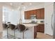 Modern kitchen with stainless steel appliances and an island at 17917 W Amberwood Dr, Goodyear, AZ 85338