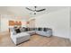 Open concept Gathering room with kitchen views and comfortable seating at 17917 W Amberwood Dr, Goodyear, AZ 85338