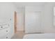 Spacious bedroom with a large closet and neutral decor at 17917 W Amberwood Dr, Goodyear, AZ 85338