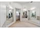 Spacious dressing room with multiple mirrors and built-in storage at 7801 N Sherri Ln, Paradise Valley, AZ 85253