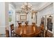 Elegant dining room featuring a round table and chandelier at 7801 N Sherri Ln, Paradise Valley, AZ 85253